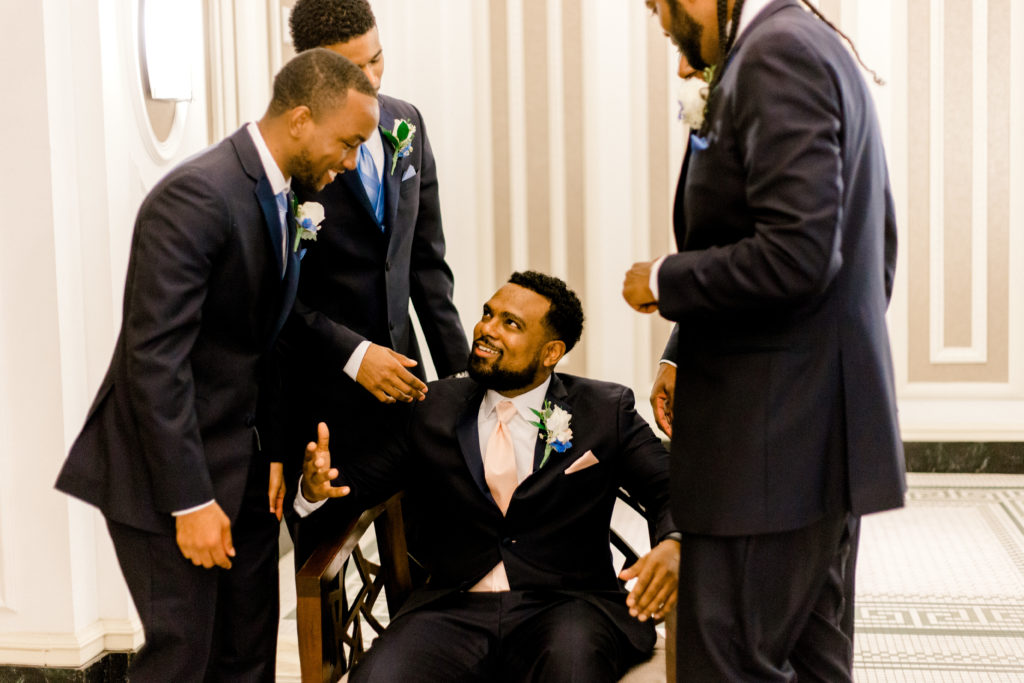Barry and the groomsmen in Savvi Formalwear.